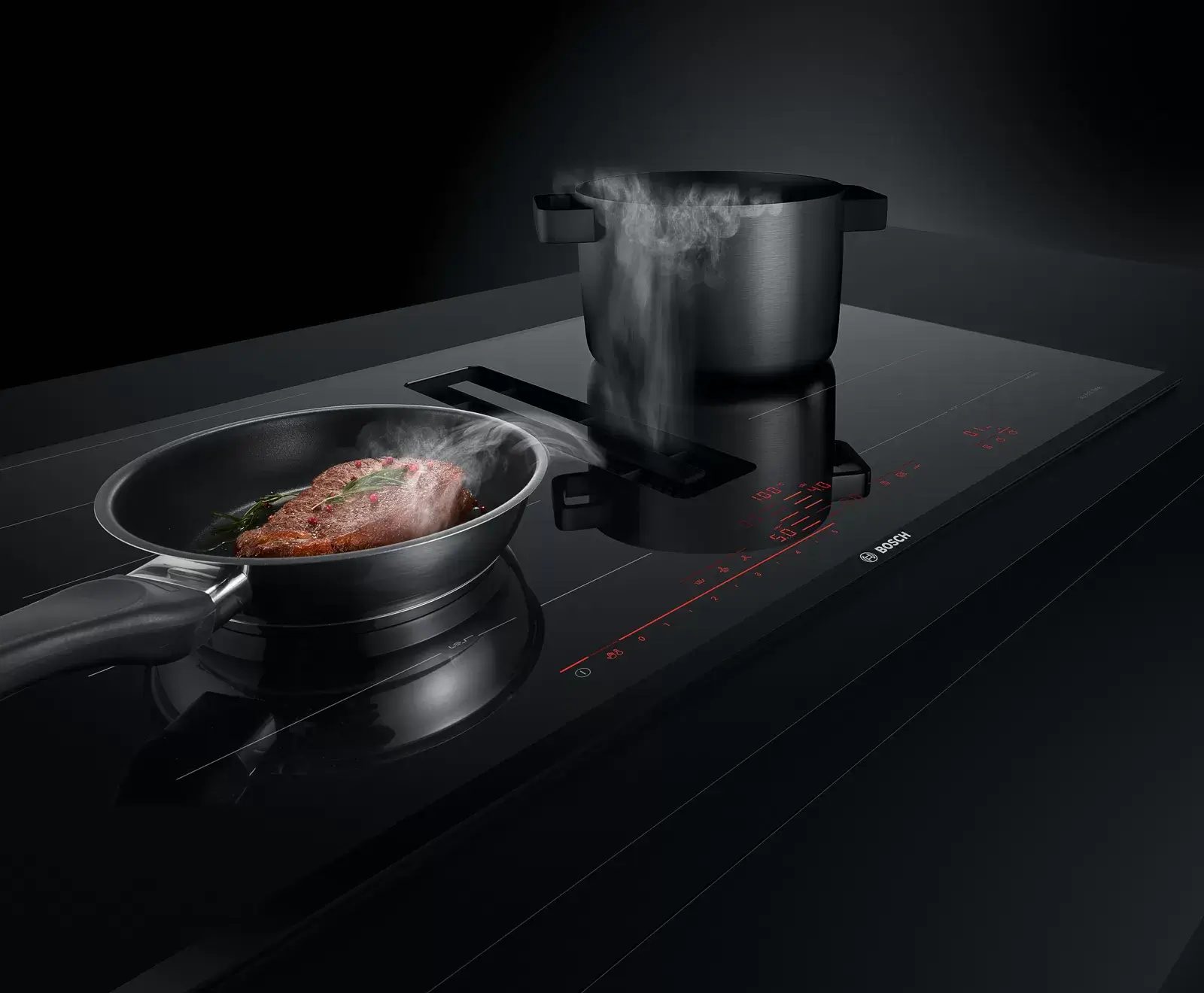 Dunstabzug: Bosch accent line Induktionskochfeld mit integriertem Kochfeldabzug